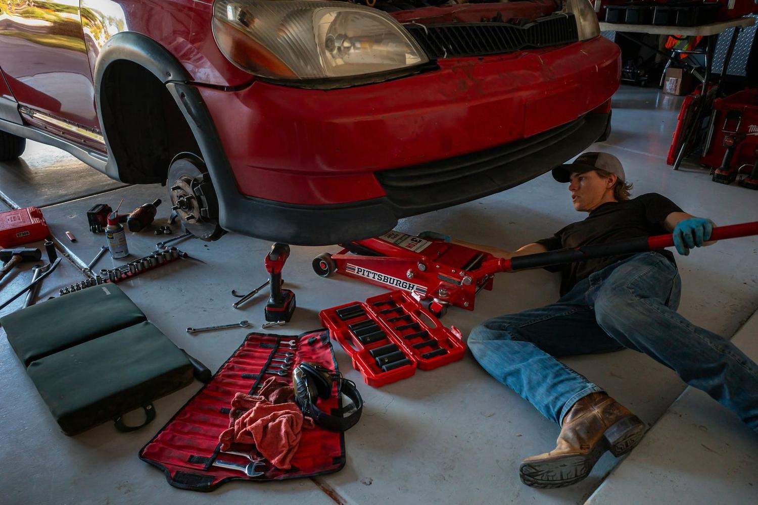 A car up on the ramp in the AXLE workshop